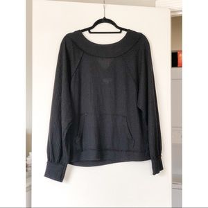 Black long sleeve sweater.